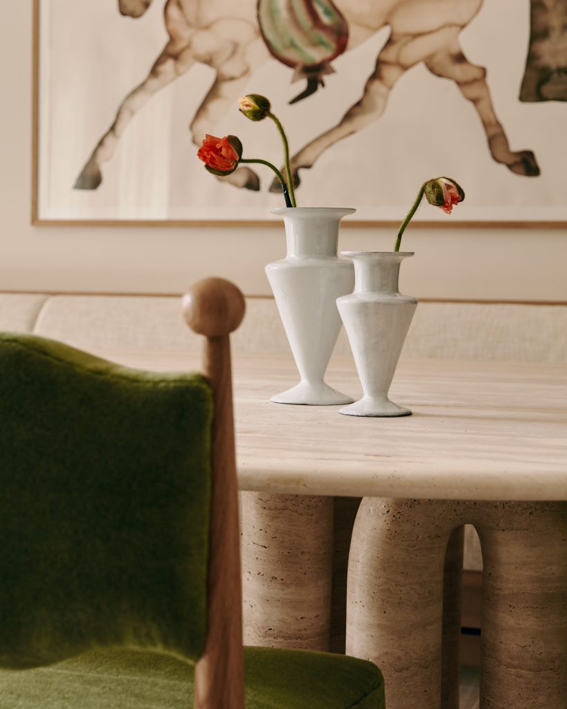 Detail of the looping travertine table base at Mulberry Townhouse.