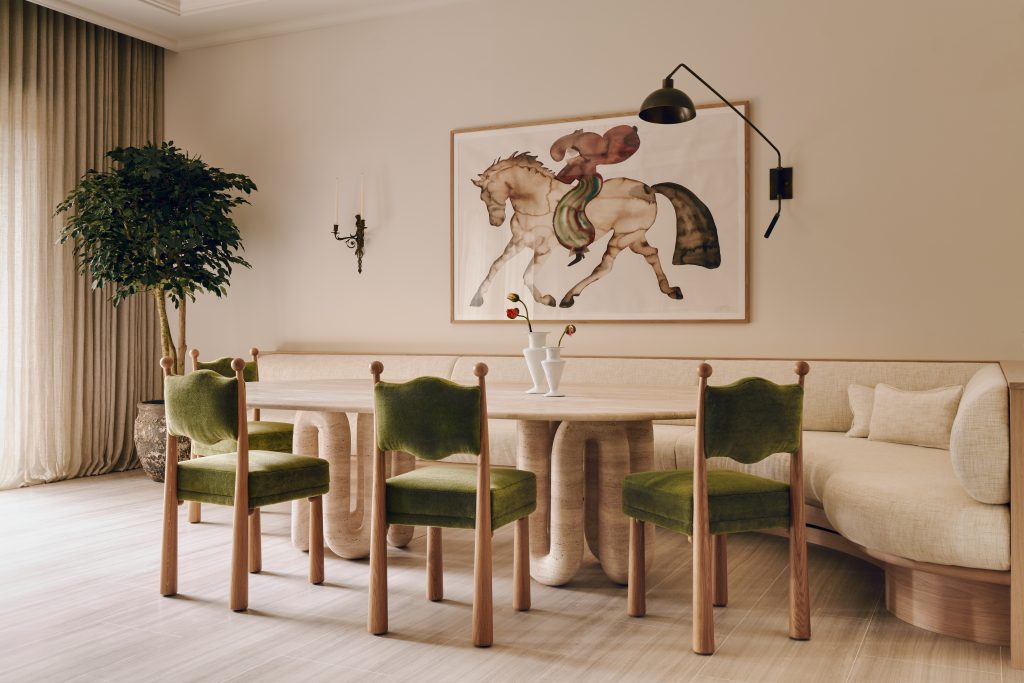 Sculptural travertine table in the Mulberry Townhouse dining space.